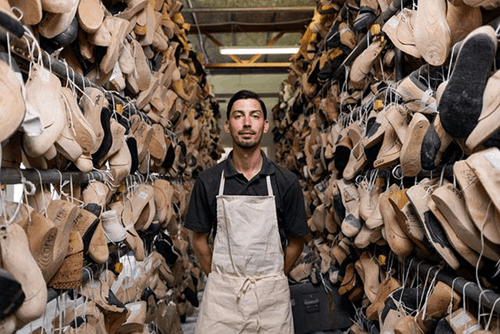 A temporary worker in a shoe shop.