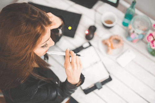 A woman working at her desk