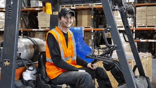 A night worker in a warehouse.