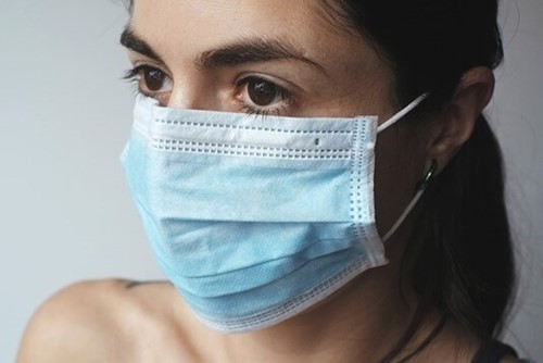 woman wearing medical face mask