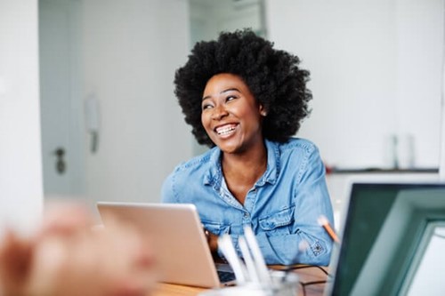 an employee smiling while being onboarded