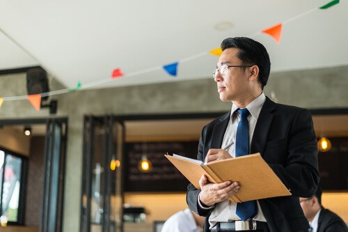 employer using a clipboard