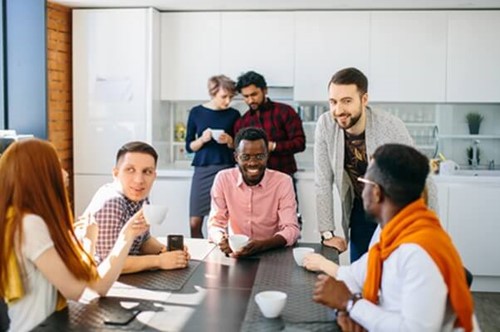 a group of employees chatting on break