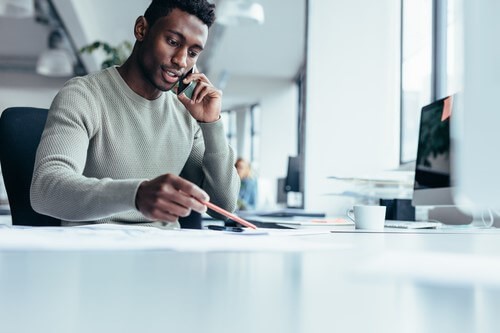 An employer talking to a staff member about absence