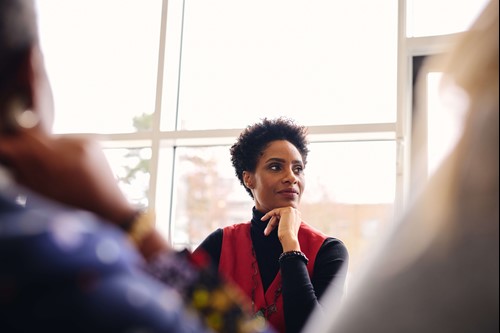 An employee focused in a meeting